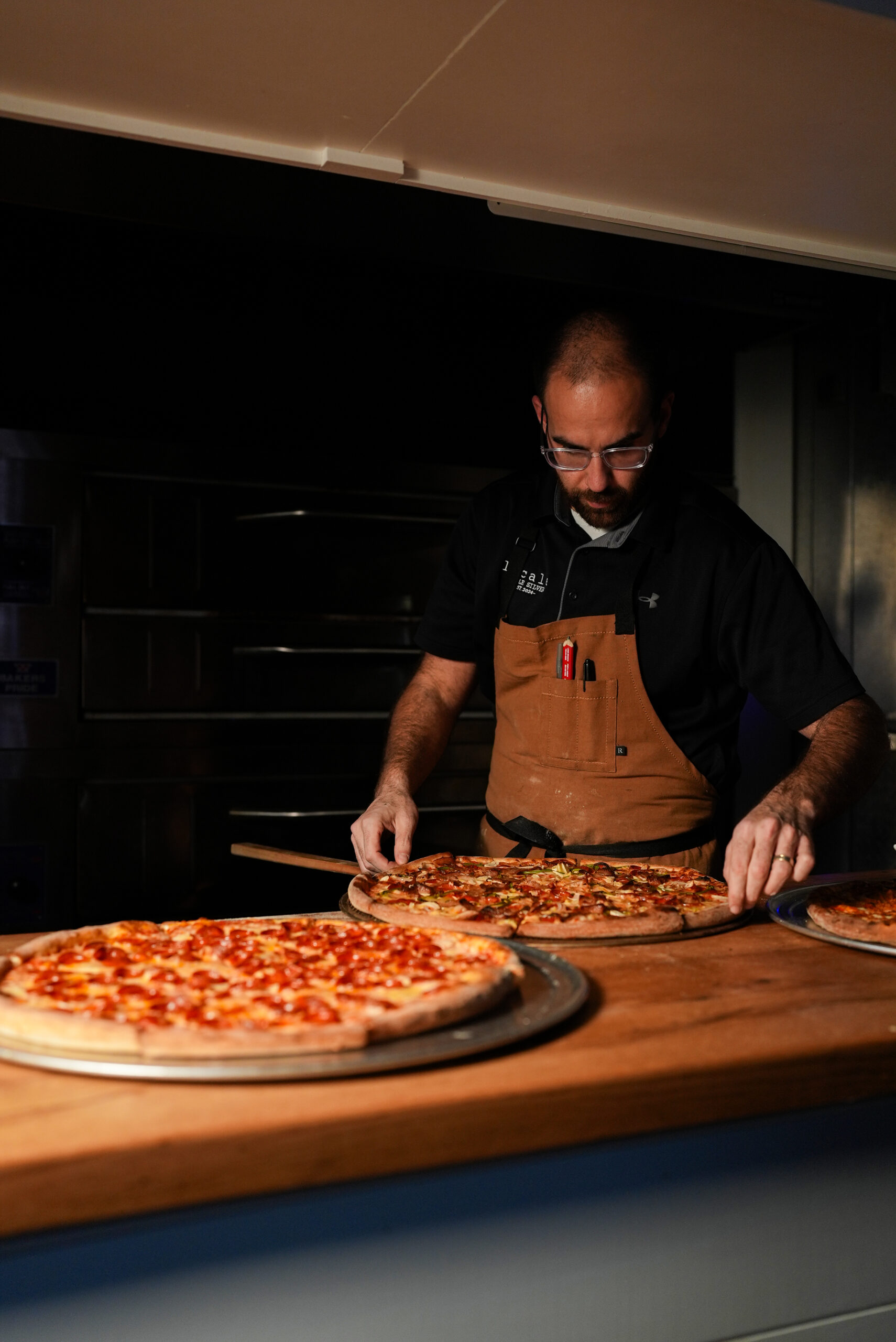 Locales Giuseppe Making Fresh Pizza