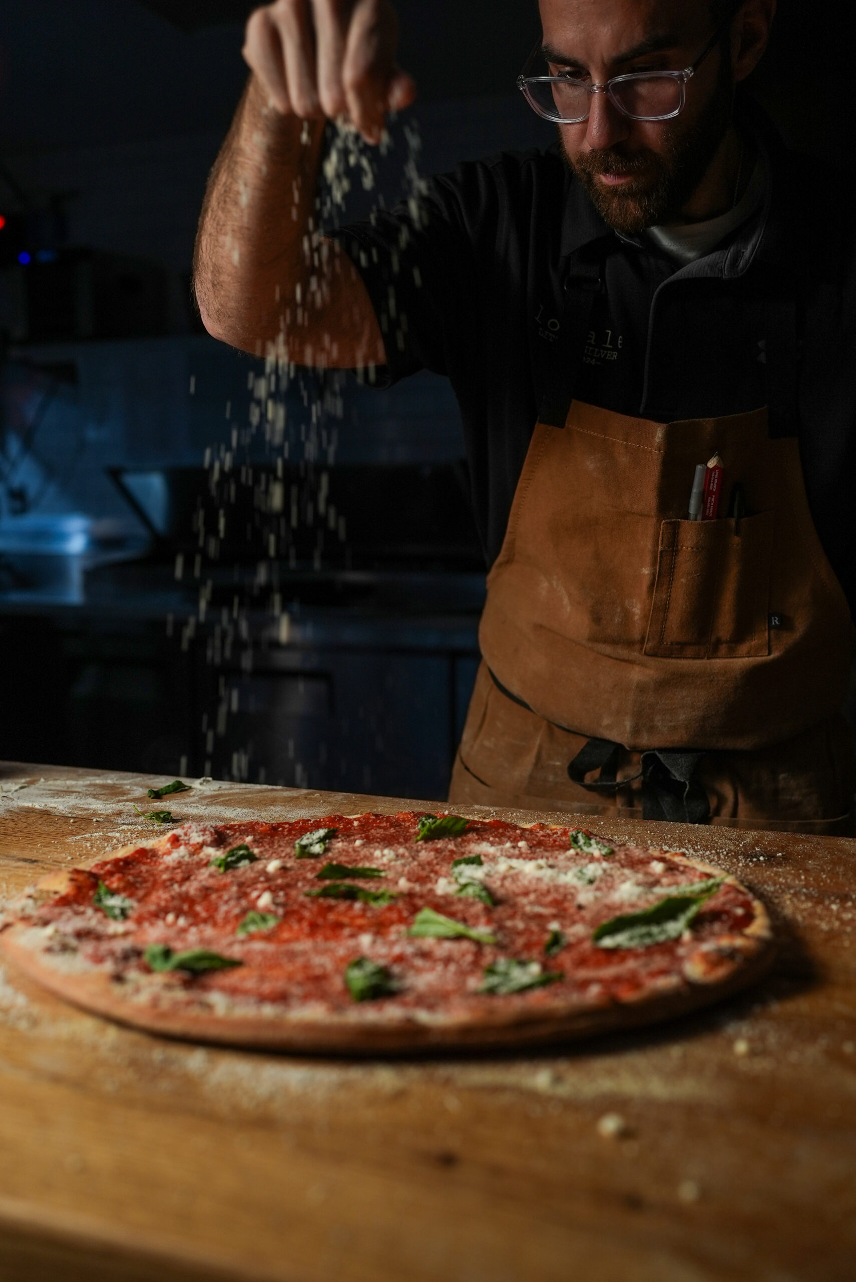 Giuseppe Finishing a Pizza