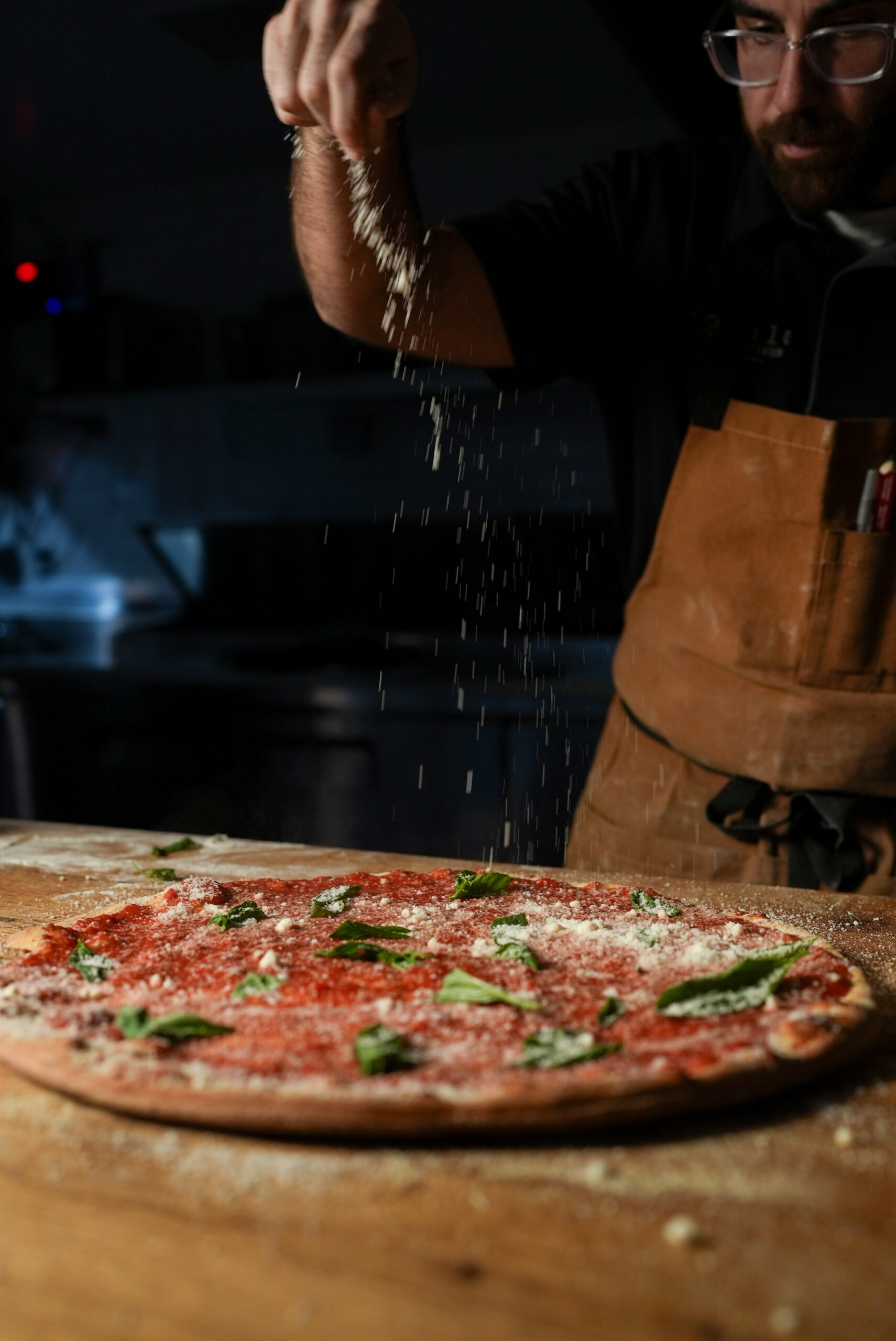 Giuseppe Finishing a Pizza