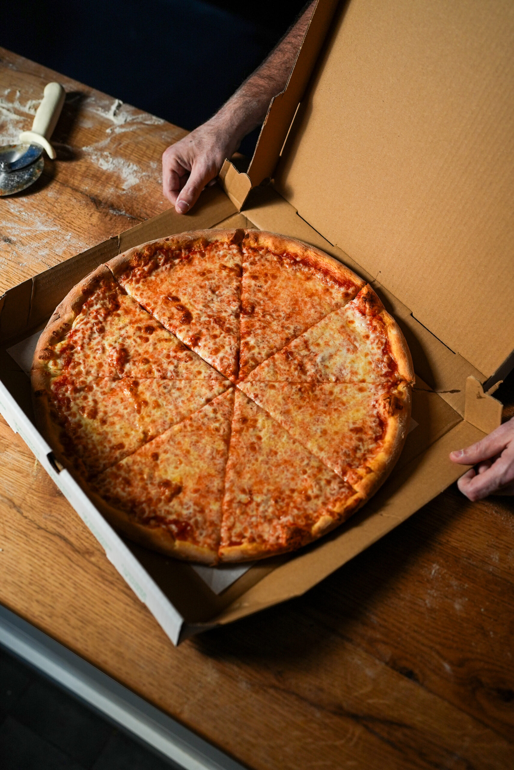 Locales Boxing Up a Fresh Pizza